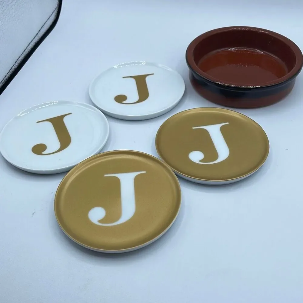 The Cellar for a Macy’s “J” coasters and wine bottle holder.